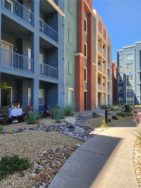 View of apartment building / complex with central