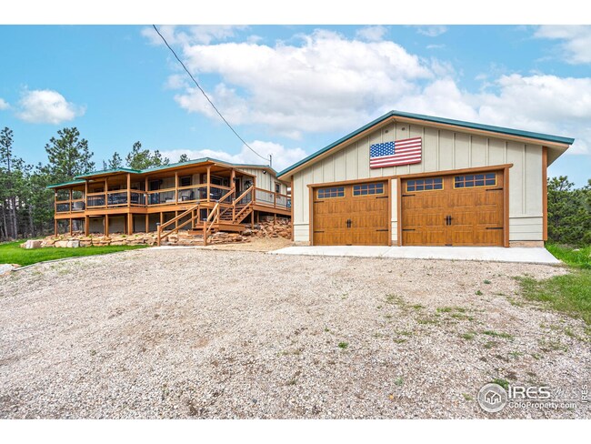Enjoy the oversized two-car garage with concrete floors and extra storage