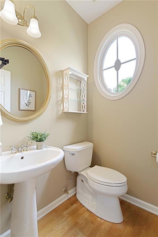 Convenient main-level powder room with pedestal si