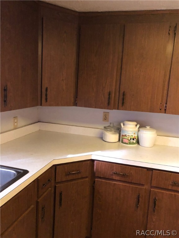 Original cabinets and counter tops.