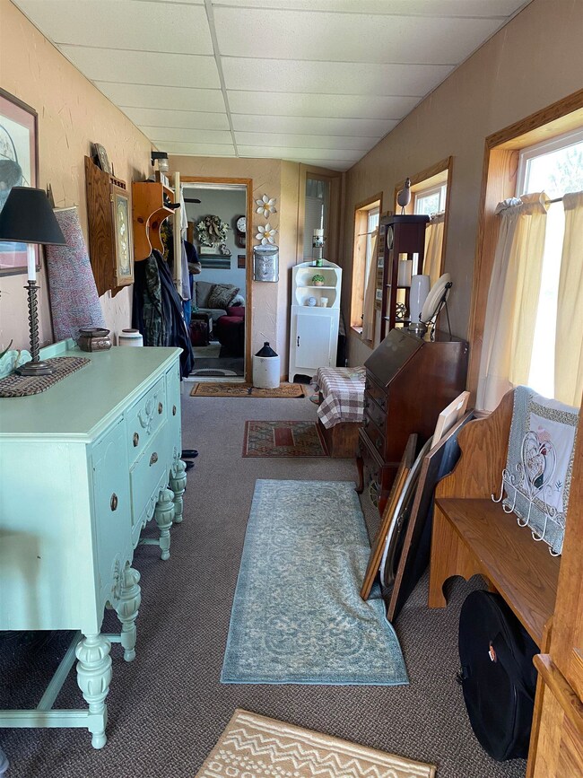 Shared hallway access passing apartment #1 into ap