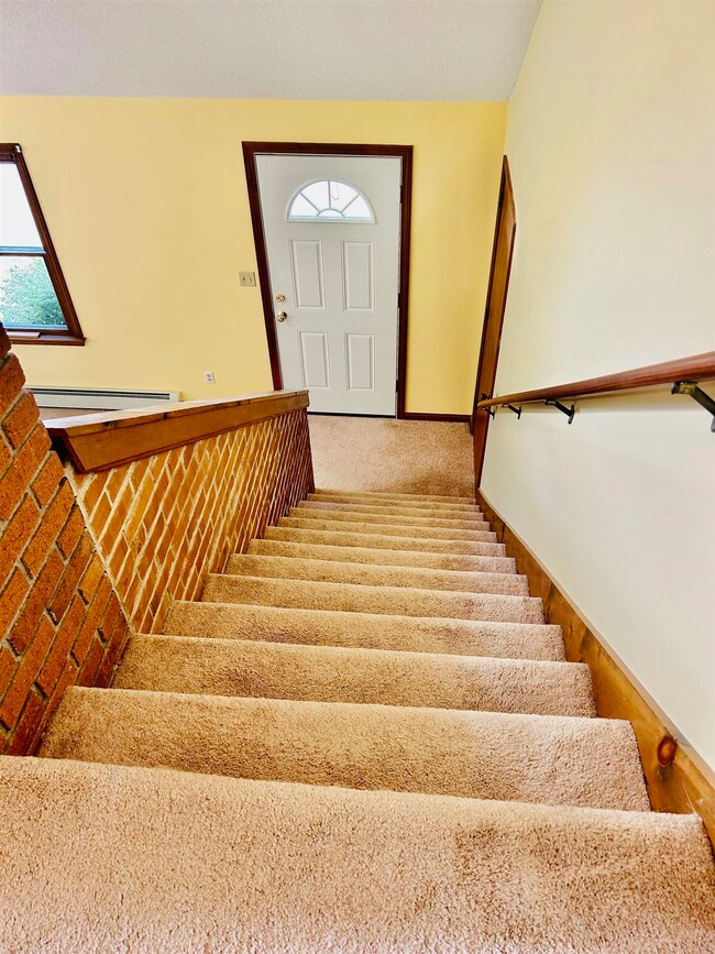 The stairs lead to the loft, bedroom and bathroom 