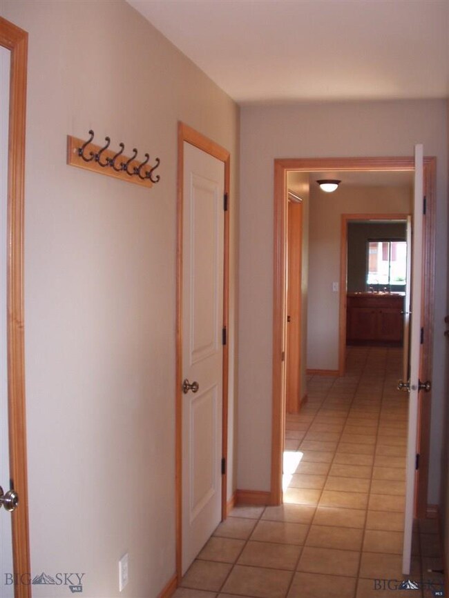 Tile Hall from Garage to Kitchen