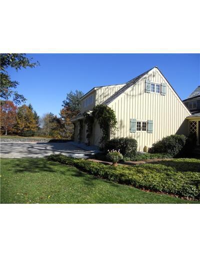 Facade/Exterior Front. Three-Car...