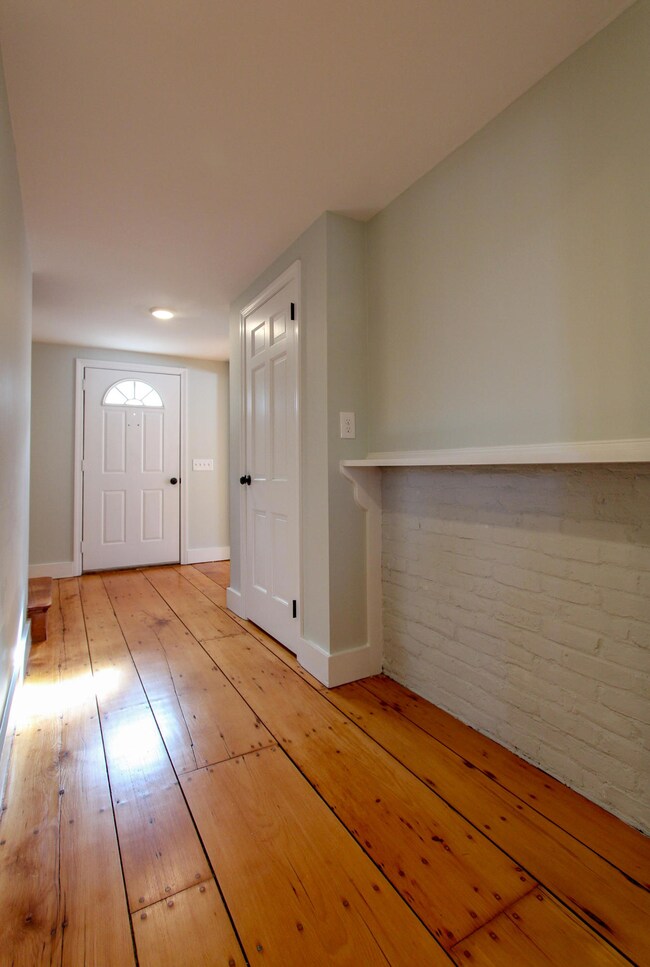 Foyer with Exposed Brick