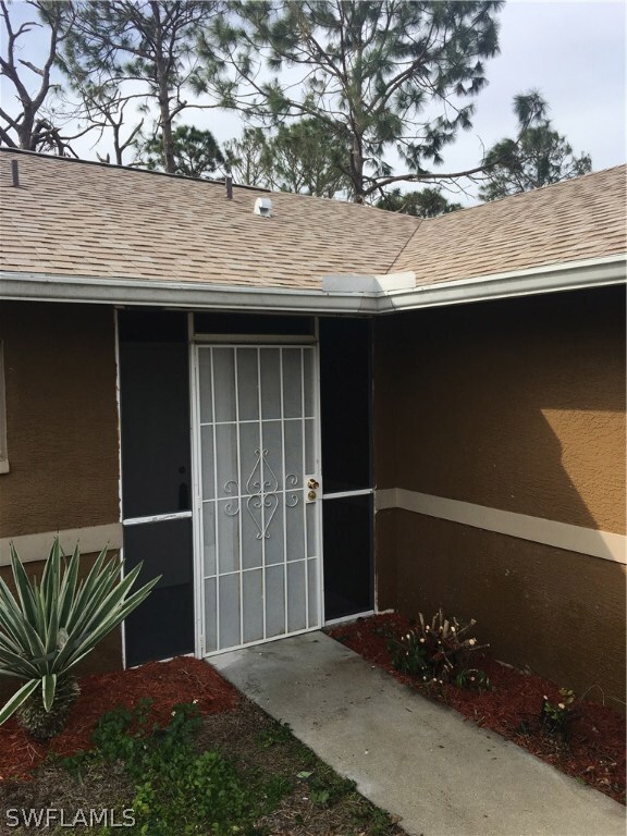 906 Naples Ave S, Lehigh Acres, FL 33974 - photo 2
