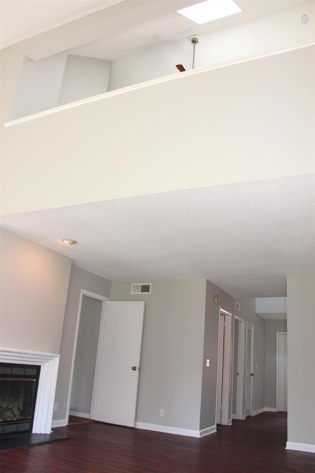 View of the upstairs loft suite from living area.  All the flooring in this home is brand new!!  Complete renovation finished 4/4/16.  