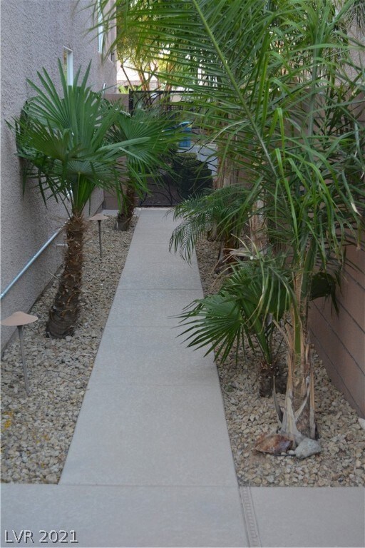 Side Yard with Pool Decking Walk to Front Yard