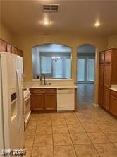 Kitchen featuring visible vents, light countertops