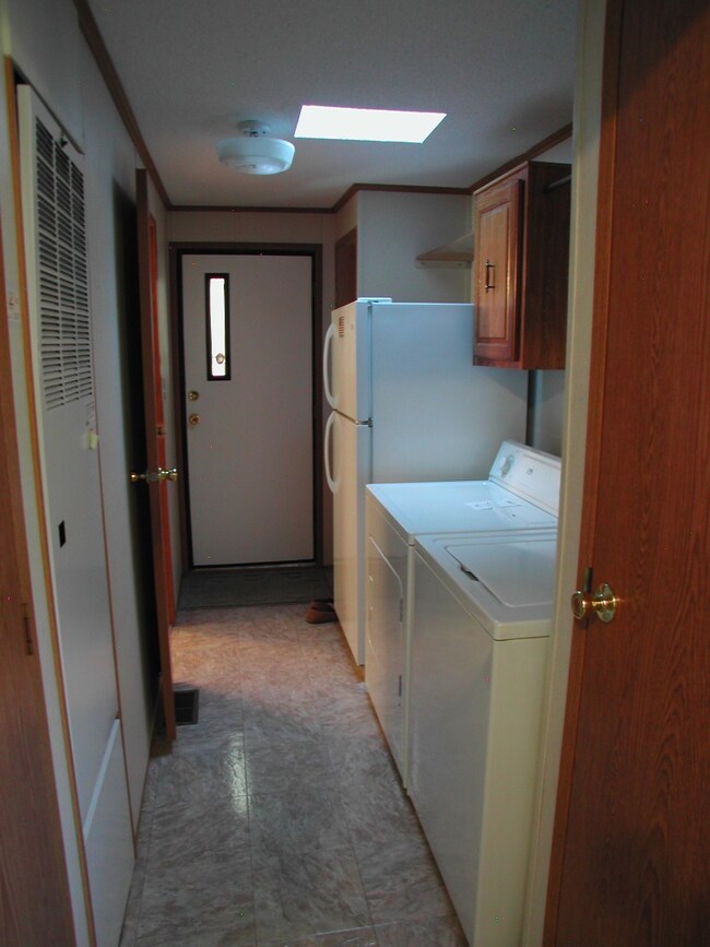 Entryway from Garage w/Laundry & Storage