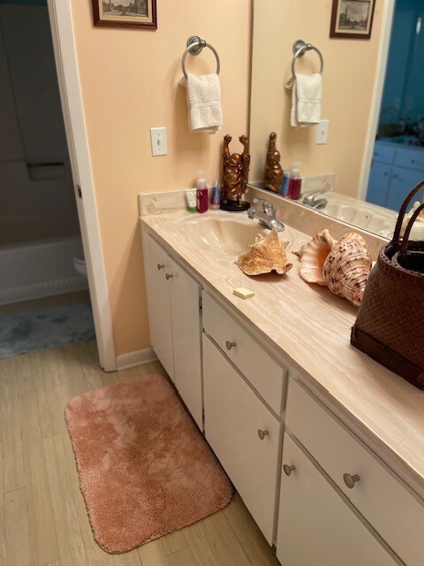 vanity in adjoining bath