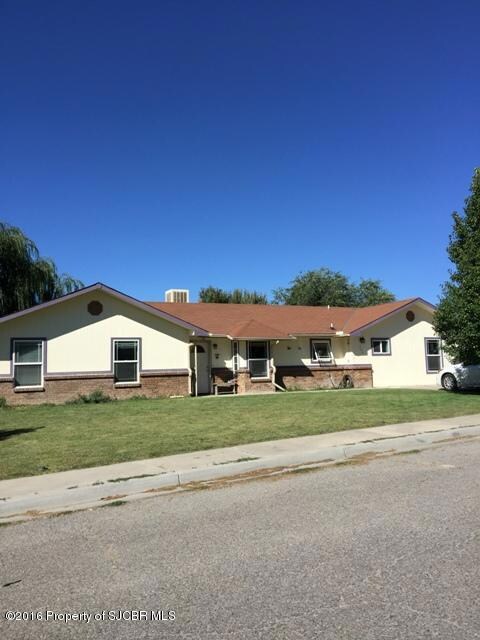 Front w/large landscaped yard