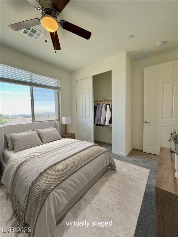 ***Virtually Staged***
Carpeted bedroom with a cl