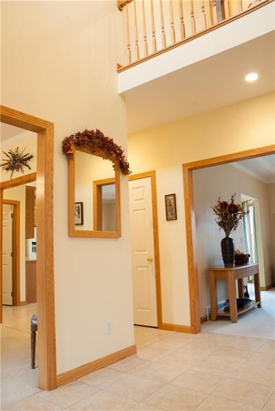 The open, 2 story foyer greats you.  Neutral paint