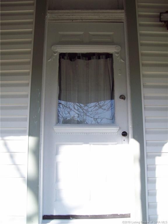 More beautiful woodworking details on back kitchen entry door.
