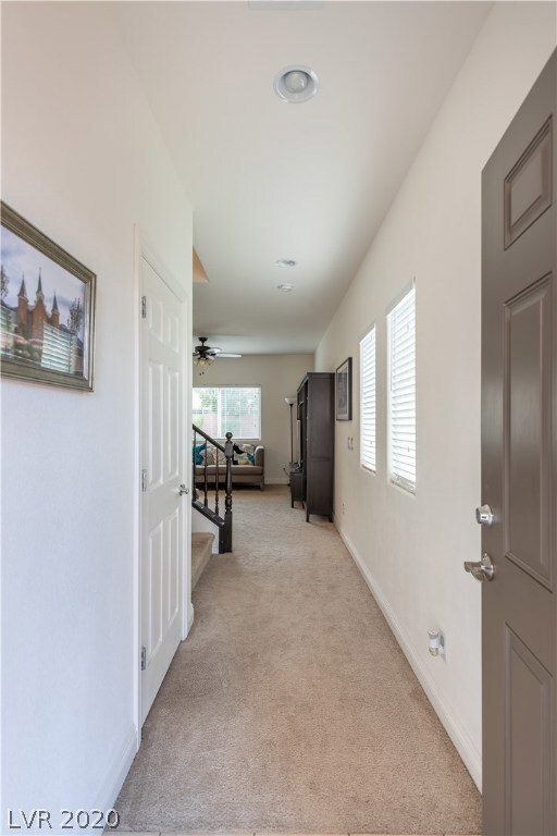 Entry hallway with large coat closet on the left
