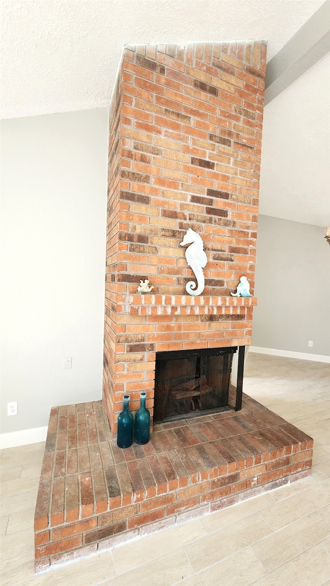 The woodburning fireplace is perfect for those chi