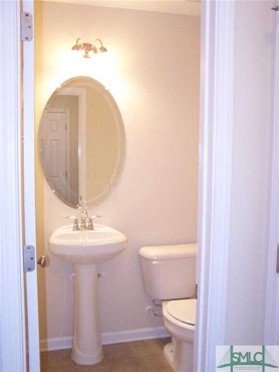 Powder bathroom located on the 1st floor for easy 