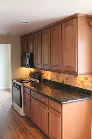 Updated kitchen cabinets and counter tops