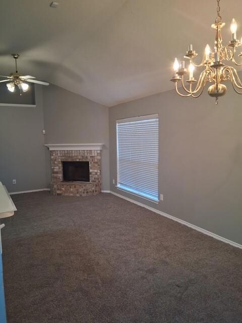 Unfurnished living room featuring baseboards, dark