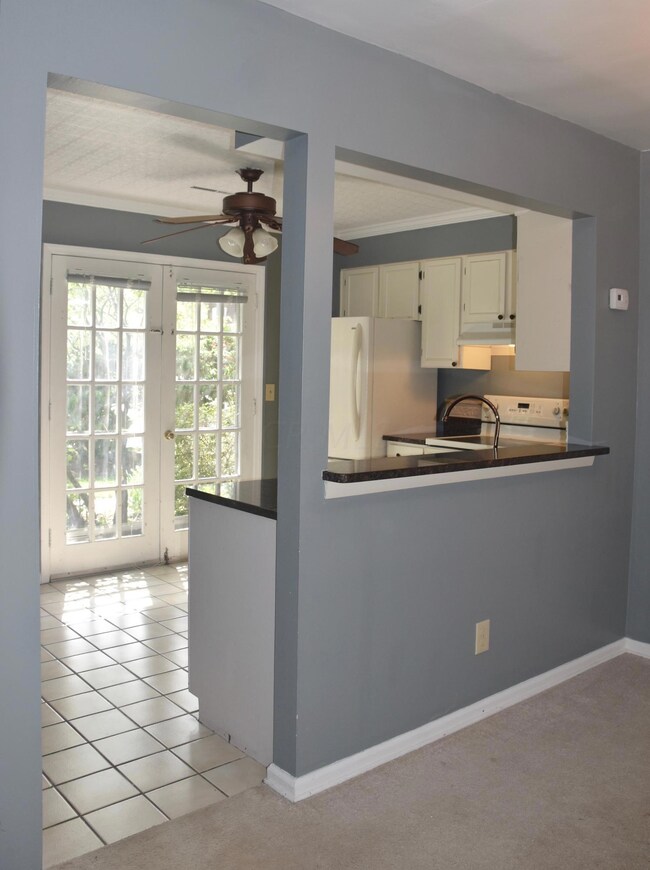 View from dining area into kitchen.
