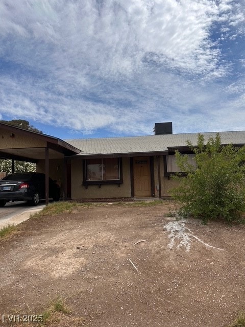 Single story home featuring driveway and an attach