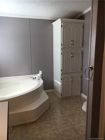 Master bathroom with garden tub and extra storage!