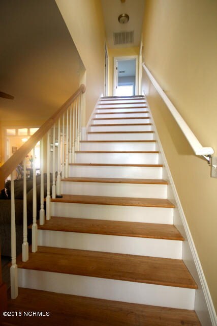 Stairway to secondary bedrooms