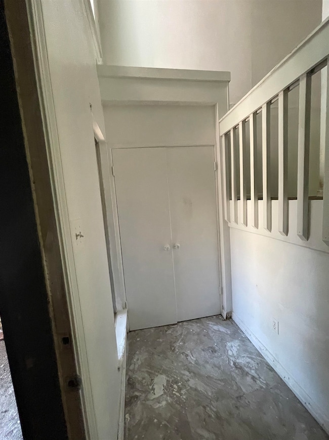 Interior space with concrete flooring
