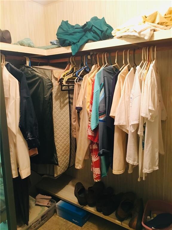 Walk in closet in the master bedroom.
