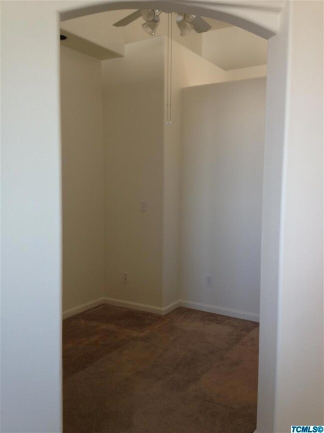 Media room sits off living room/kitchen.