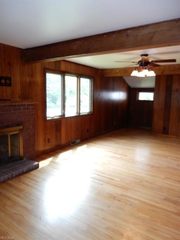 Family Room With Wood Burning Fireplace and Wood F
