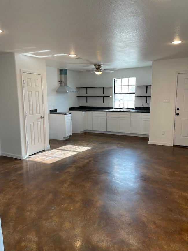 Kitchen & Family Room. Modern open shelving with c