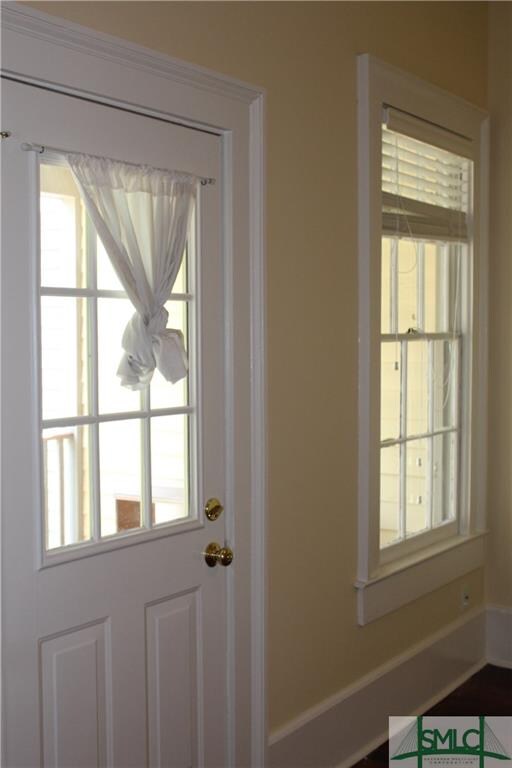 master bedroom with door to deck upstairs