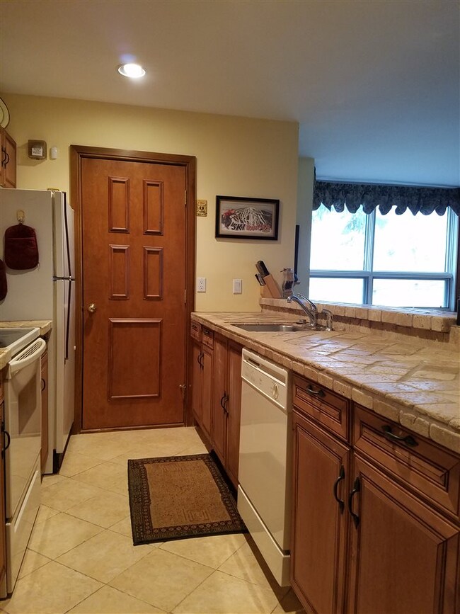 New tile, new cabinets, light, bright and open  to