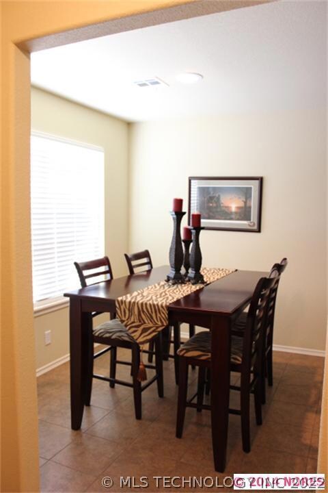 Looking from entryway to eat-in kitchen