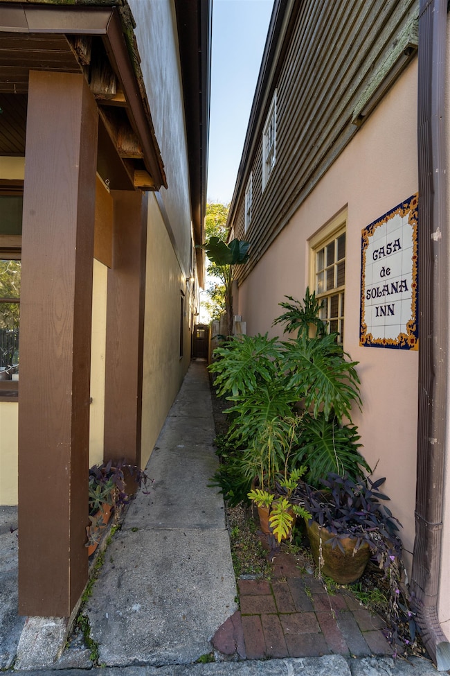 View of property exterior featuring stucco siding
