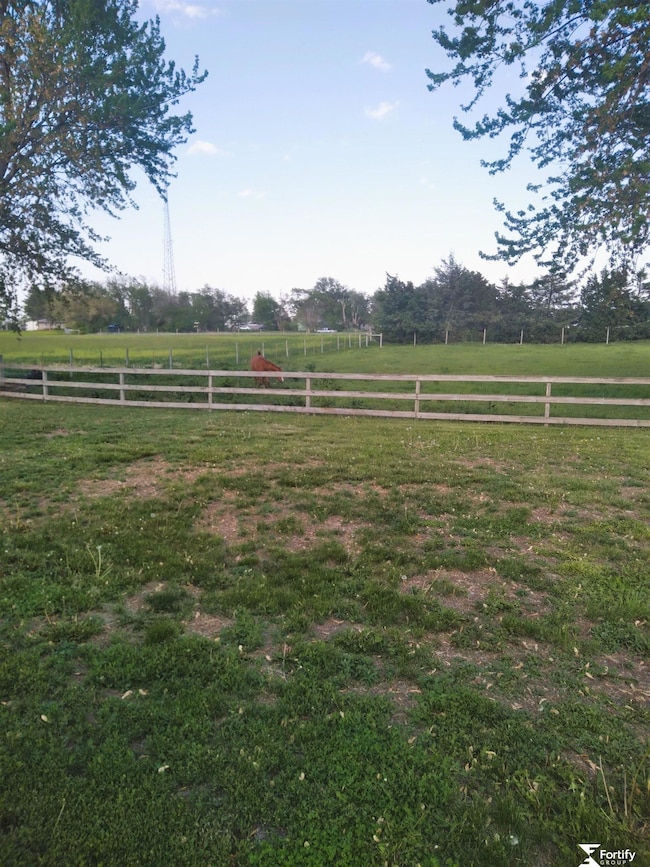 View from the sliding glass door of the kitchen and the deck.