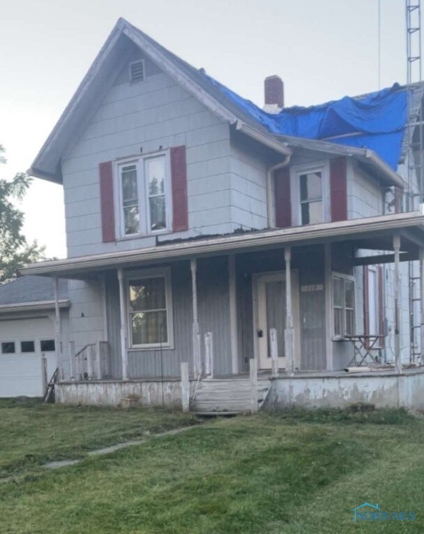 The roof needs replaced. It has a temporary patch