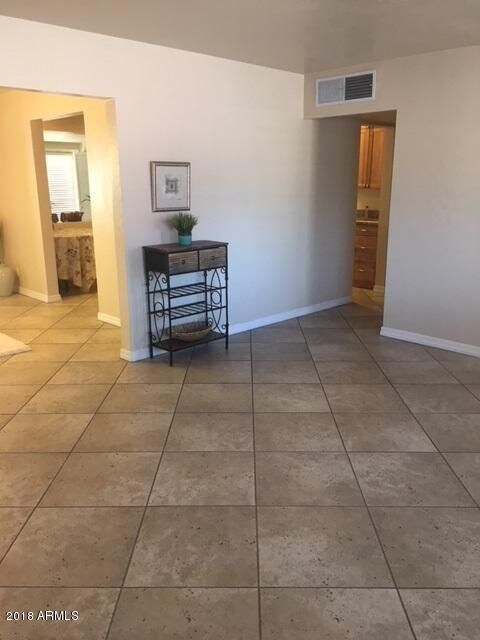 Great room looking to dining, kitchen an