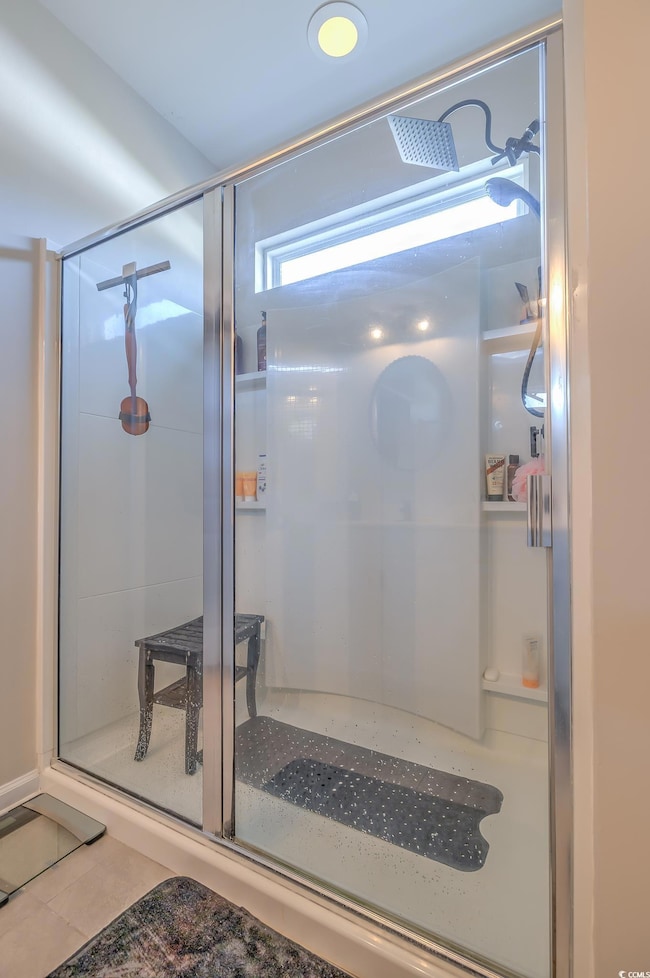 Full bathroom with a shower with shower door