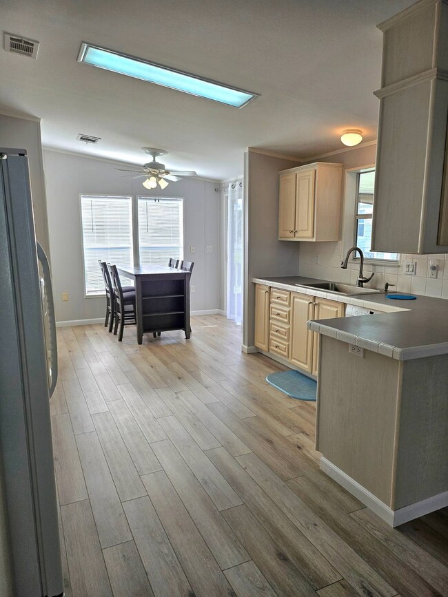 Living Room into Kitchen and Dining Area