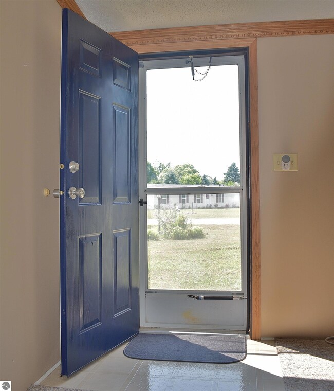 1655 Solstice St, Grawn, MI 49637 - photo 2