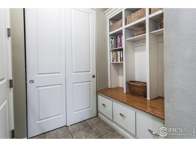 Custom Mudroom with Oak Bench and Upper Cabinet