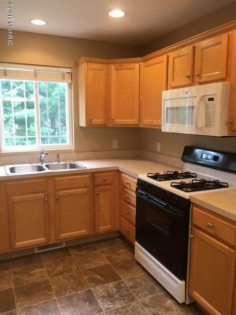 1361 Echoing Valley Dr SW unit 32, Byron Center, MI 49315 - photo 2