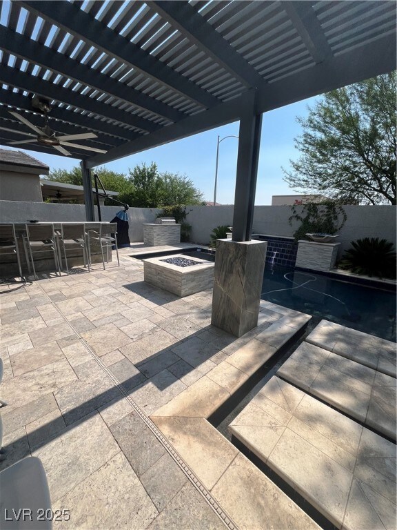Fenced backyard featuring outdoor dining area, an