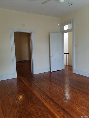Bed room has doors to the living room and to the h