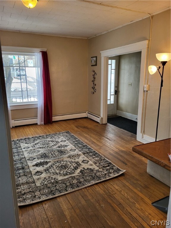Foyer Has Glass Front Doors & a Hall Closet.