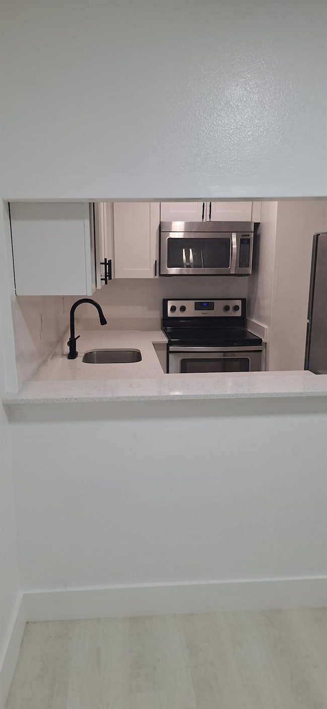 1305 W 46th St unit 125, Hialeah, FL 33012 - photo 2