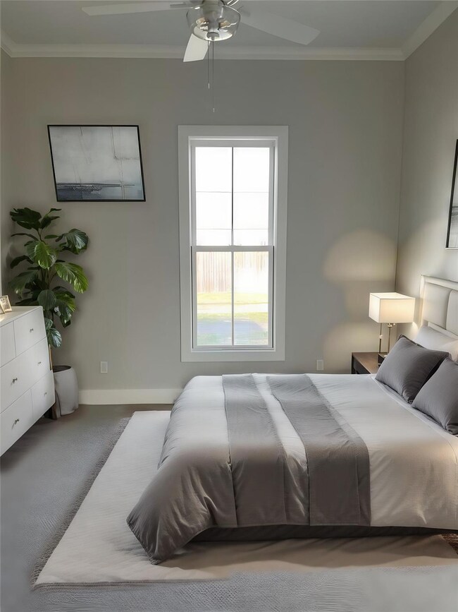 Carpeted primary bedroom with ceiling fan and crow